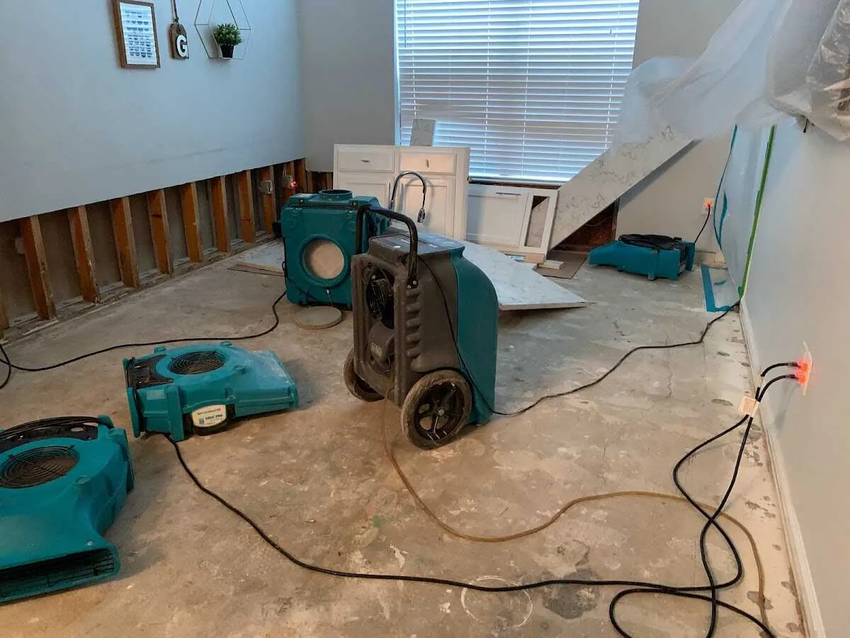 Dehumidifier in flood-cut room for Water Damage Restoration in Charleston