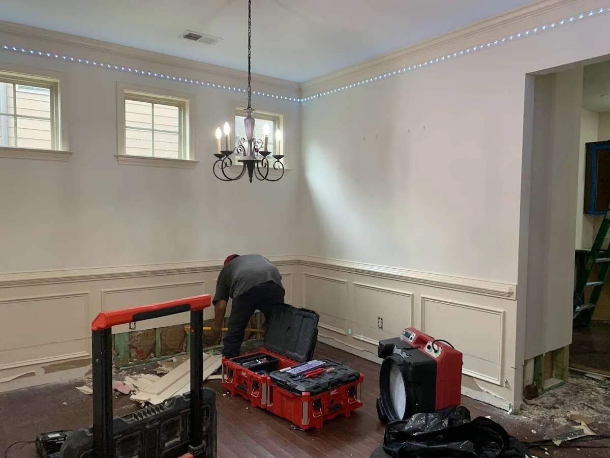 Restoration technician with professional equipment in Charleston